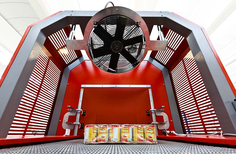 Heat-shrink tunnel outlet